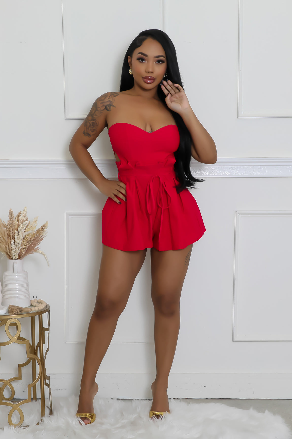 In Her Feminine Romper