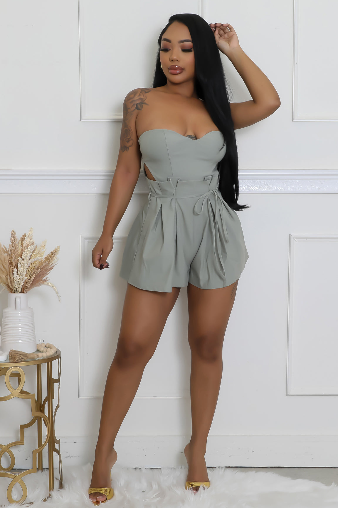 In Her Feminine Romper