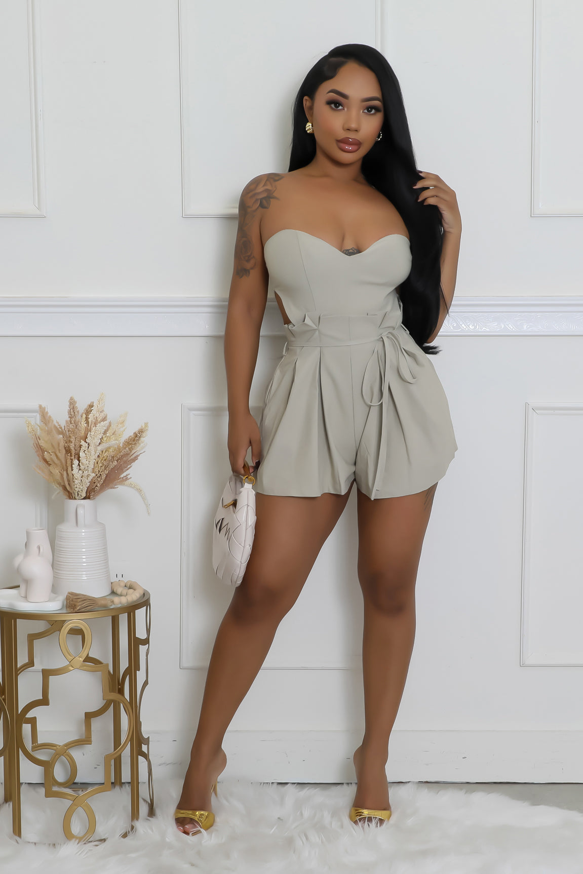 In Her Feminine Romper