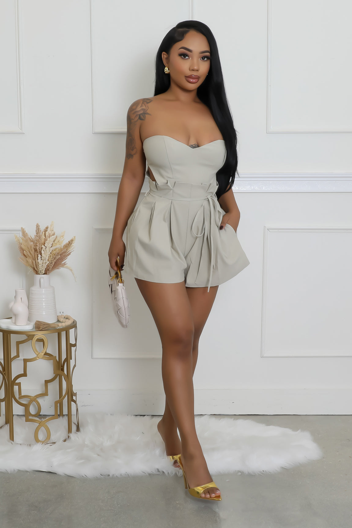 In Her Feminine Romper